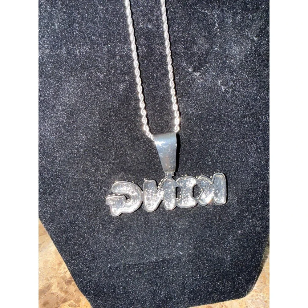 King pendant necklace with rhinestones